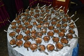 cups with watalappam on a table in Sri Lanka