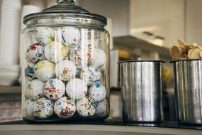 round candy in a transparent jar