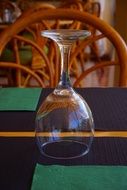 upside-down clear glass wine