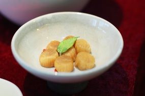 scallops, seafood in white bowl