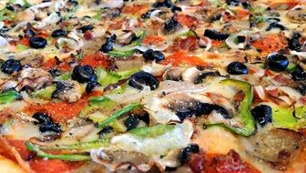 large pizza with olives