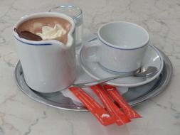 hot chocolate in a cup on a plate