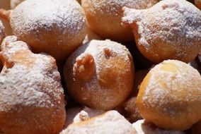 donuts in powdered sugar close-up