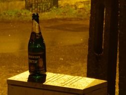 green glass bottle with champagne