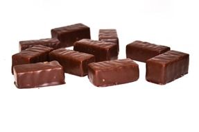 sweet dark chocolate candy on white