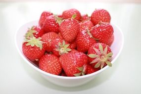 red strawberries on the plate