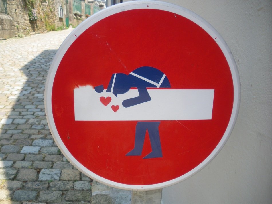 sign prohibiting the passage of gendarmes in love