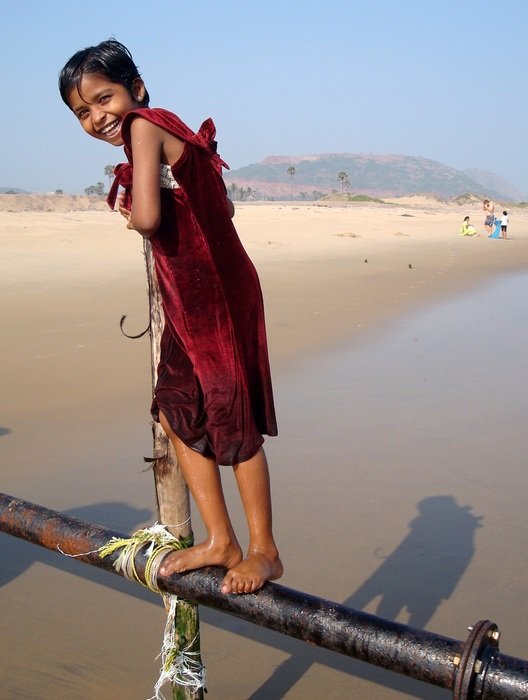smiling girl on indian beach