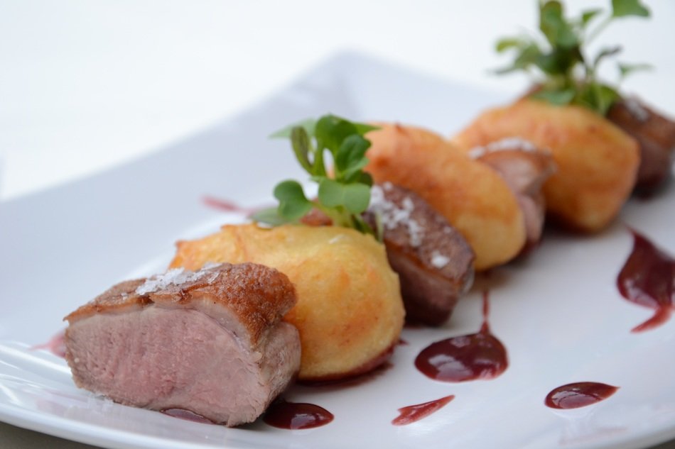 five-star restaurant, dish of roasted duck and plum