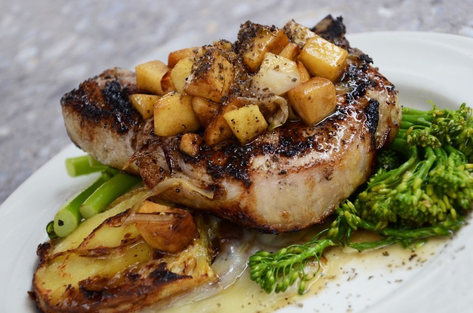 juicy pork steack with grilled broccolli