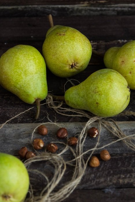 coffee beans near green pears