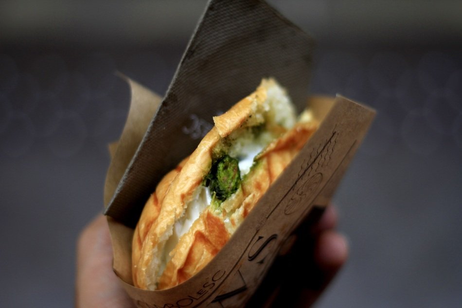 sandwich in hand