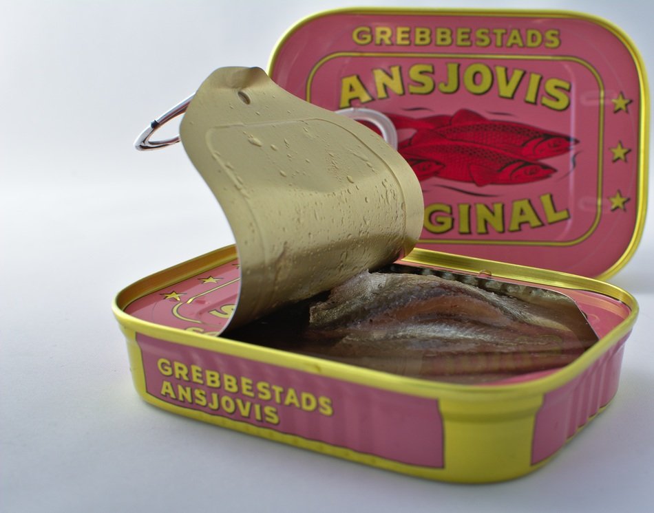 canned anchovies in a tin can
