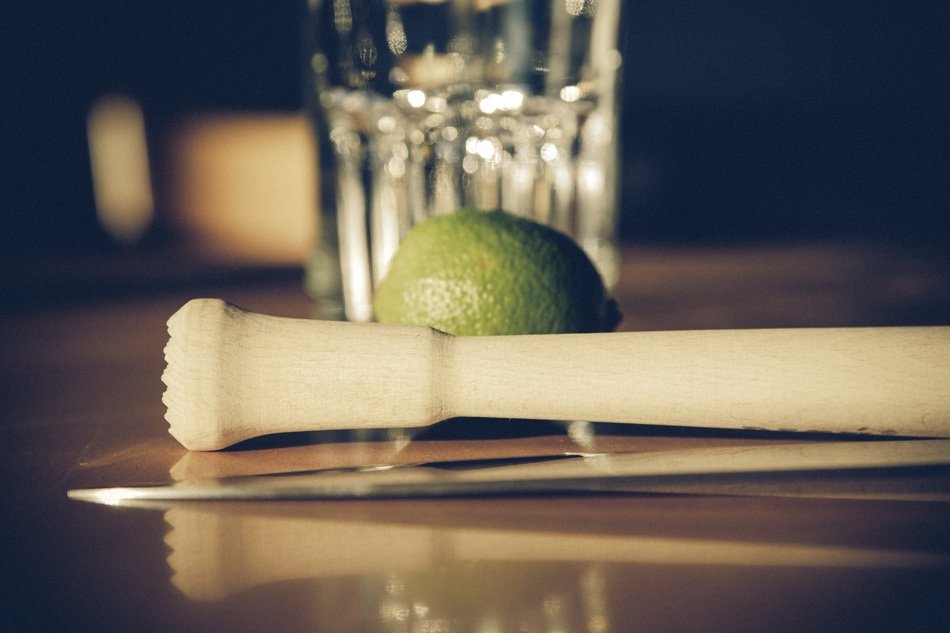 lime with a glass for preparing caipirinha