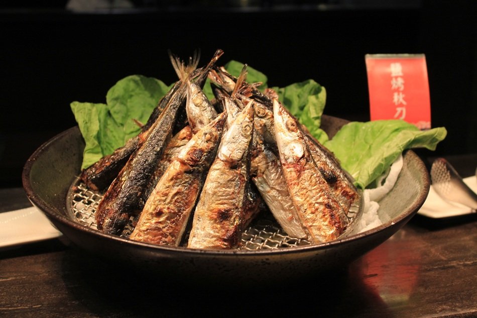 roasted fish in a plate on the table