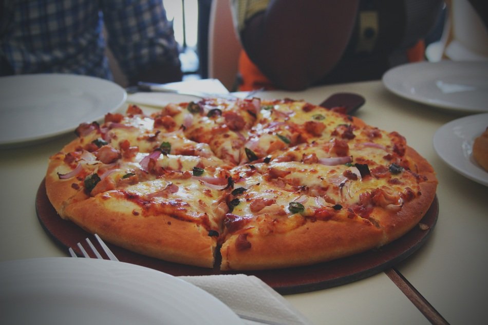 lush pizza for an italian dinner