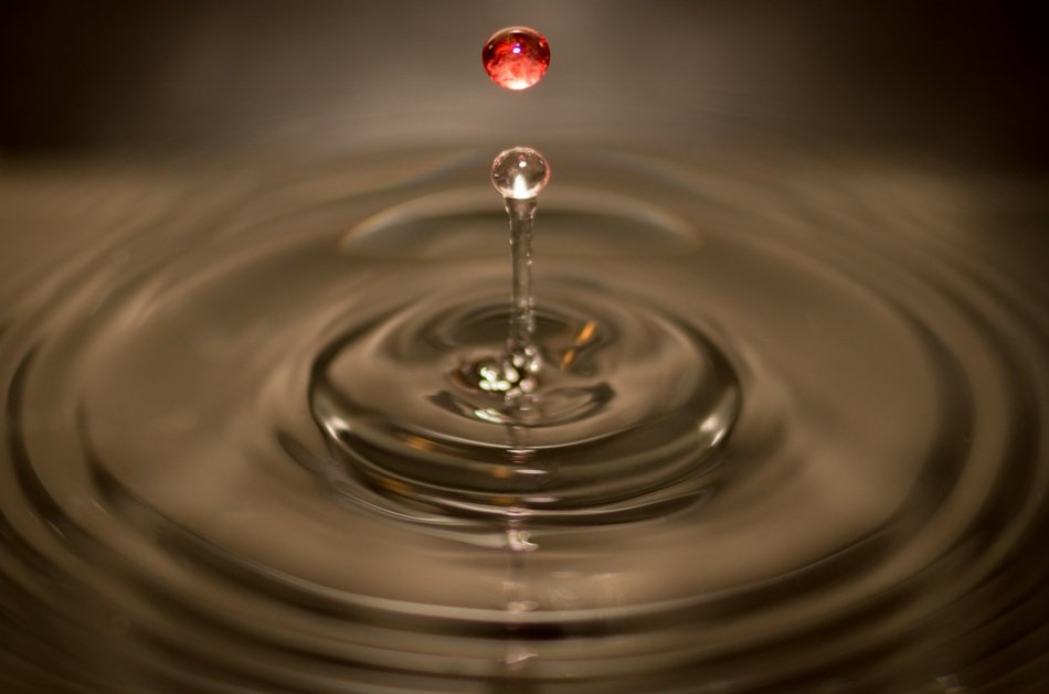 unusual drops on background of water surface
