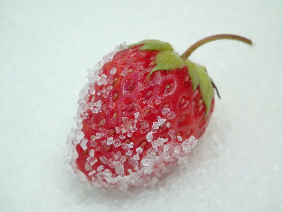 Strawberry in sugar of close-up