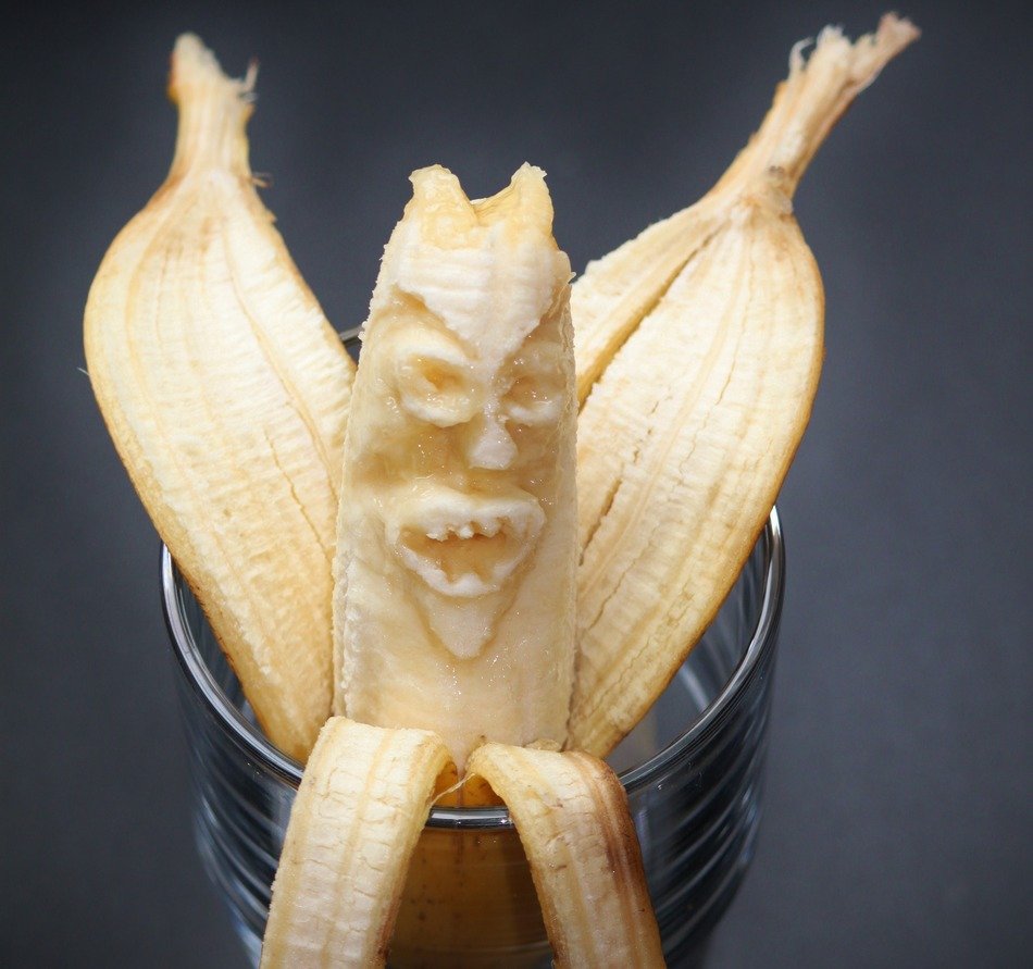 banana in a glass as a monster
