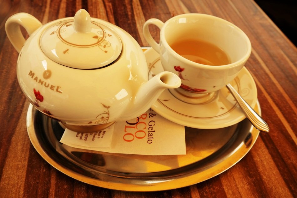 teapot and teacup on a tray