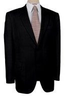 photo of a black jacket, shirt and tie on a mannequin
