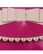white bow as decor on pink