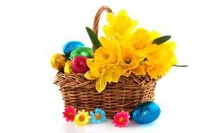 Beautiful and colorful basket with the colorful chocolate Easter Eggs