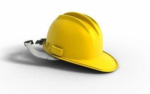 yellow construction helmet on a white surface