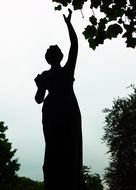 female silhouette at sky