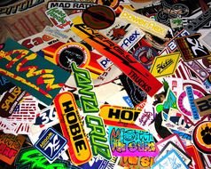 variety of skateboards with different logos