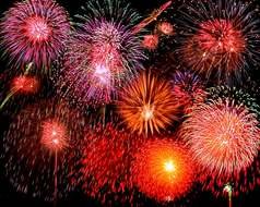 bright red fireworks against the black sky