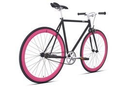 painted bicycle with pink wheels