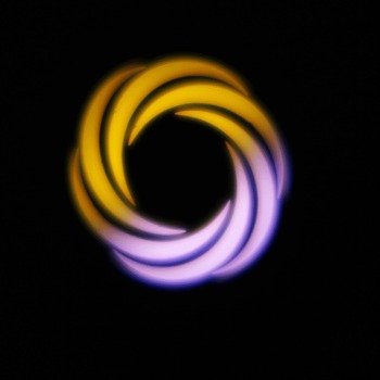 yellow and purple circle on the black background
