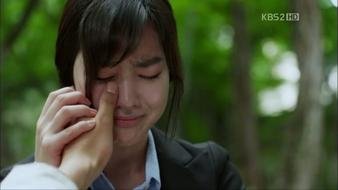 man wiping tears his woman