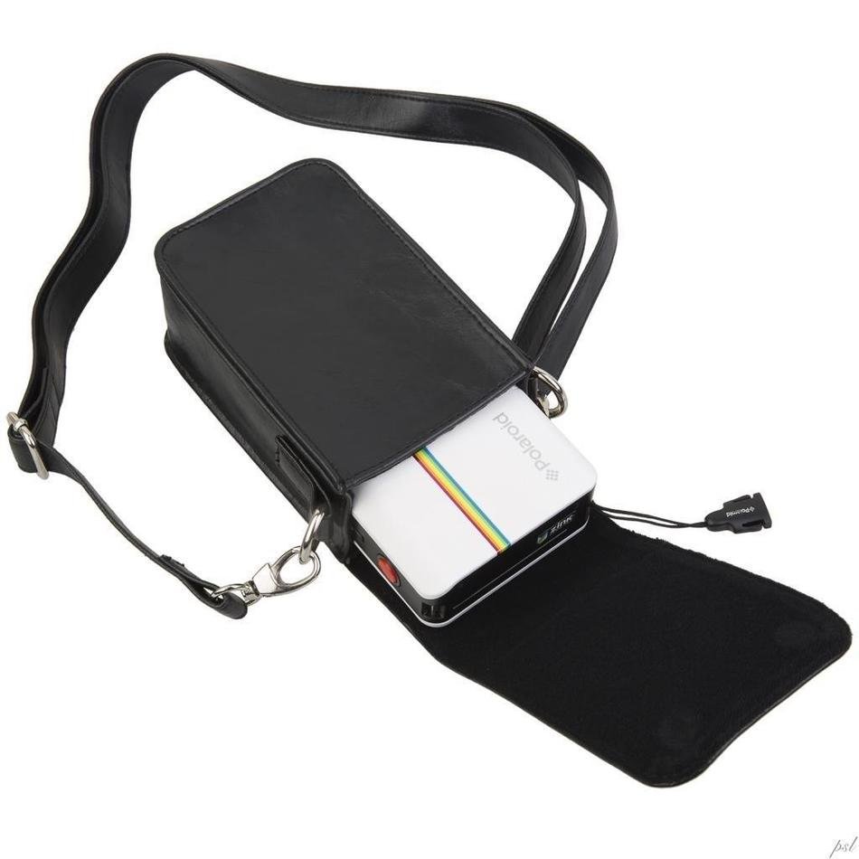 compact Camera in bag with strap