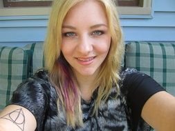 selfie blonde with a tattoo