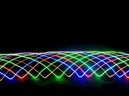 Clip Art of the colourful neon lights in a dark