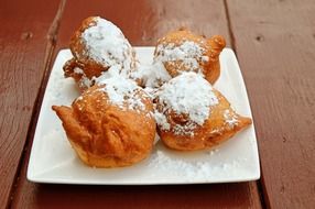 deep-fried sweets under powdered sugar