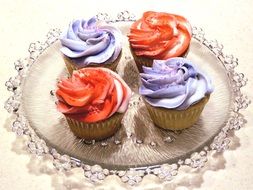 yummy cupcakes with multi-colored cream