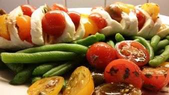 vegetables and mozzarella on a large plate