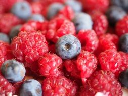 varieties of berries are in one pile