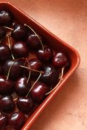 red cherries on tray