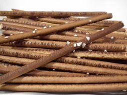 Salty baked sticks close-up