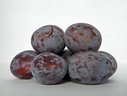 pile of ripe plums close up