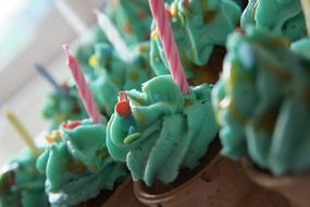 blue cupcakes as a dessert for a birthday