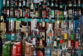 rack with a variety of alcoholic beverages