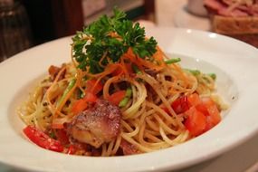 spaghetti with vegetables and herbs