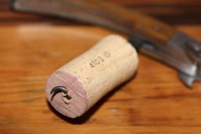 wine cork on corkscrew