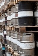 Metal barrels on the shelves