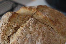 homemade baked bread close-up on blurred background